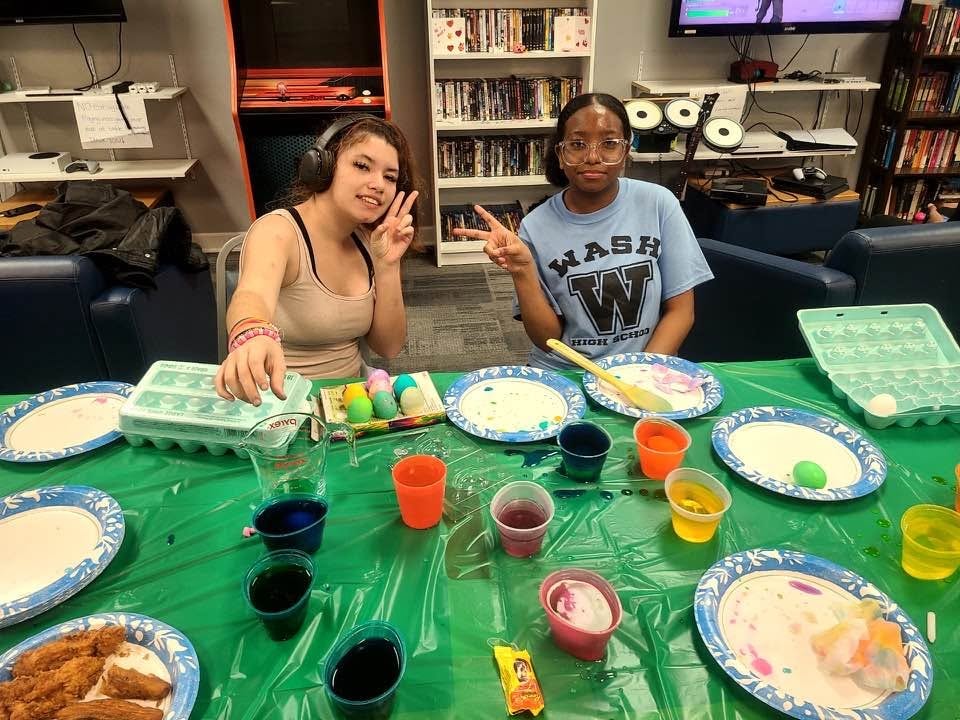 Teens doing a craft activity at the Common Ground Teen Center